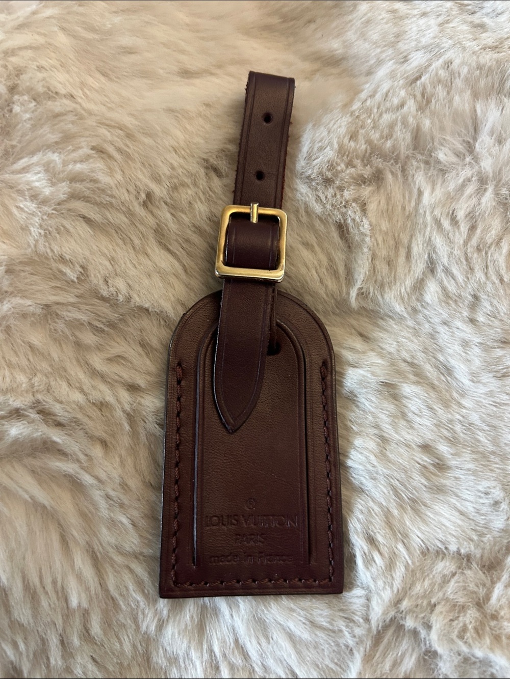 Louis Vuitton burgundy leather small luggage tag